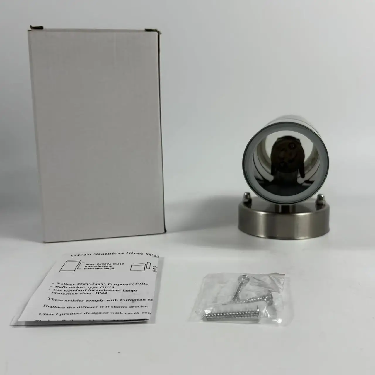 Modern Stainless Steel Outdoor LED Wall Sconce IP44-rated Up-Down Cylinder Light with Motion Sensor